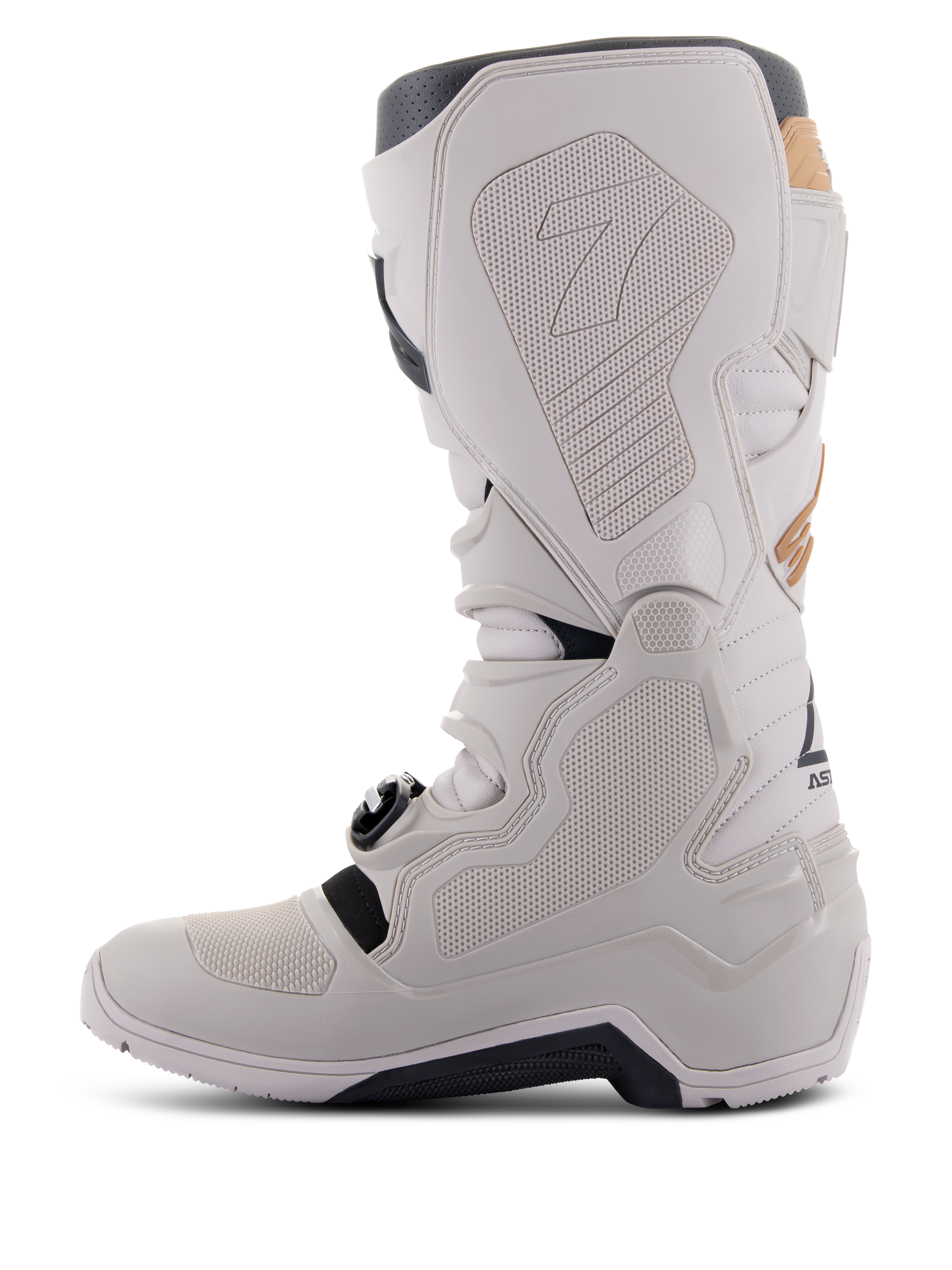 Alpinestars Tech 7 Enduro Drystar®-stövlar i Gray Sand, medial vy som visar greppaneler med bikakestruktur, ljusgrå TPU- och mikrofiberkonstruktion, svart yttersula och vattentätt membran för terrängkörning