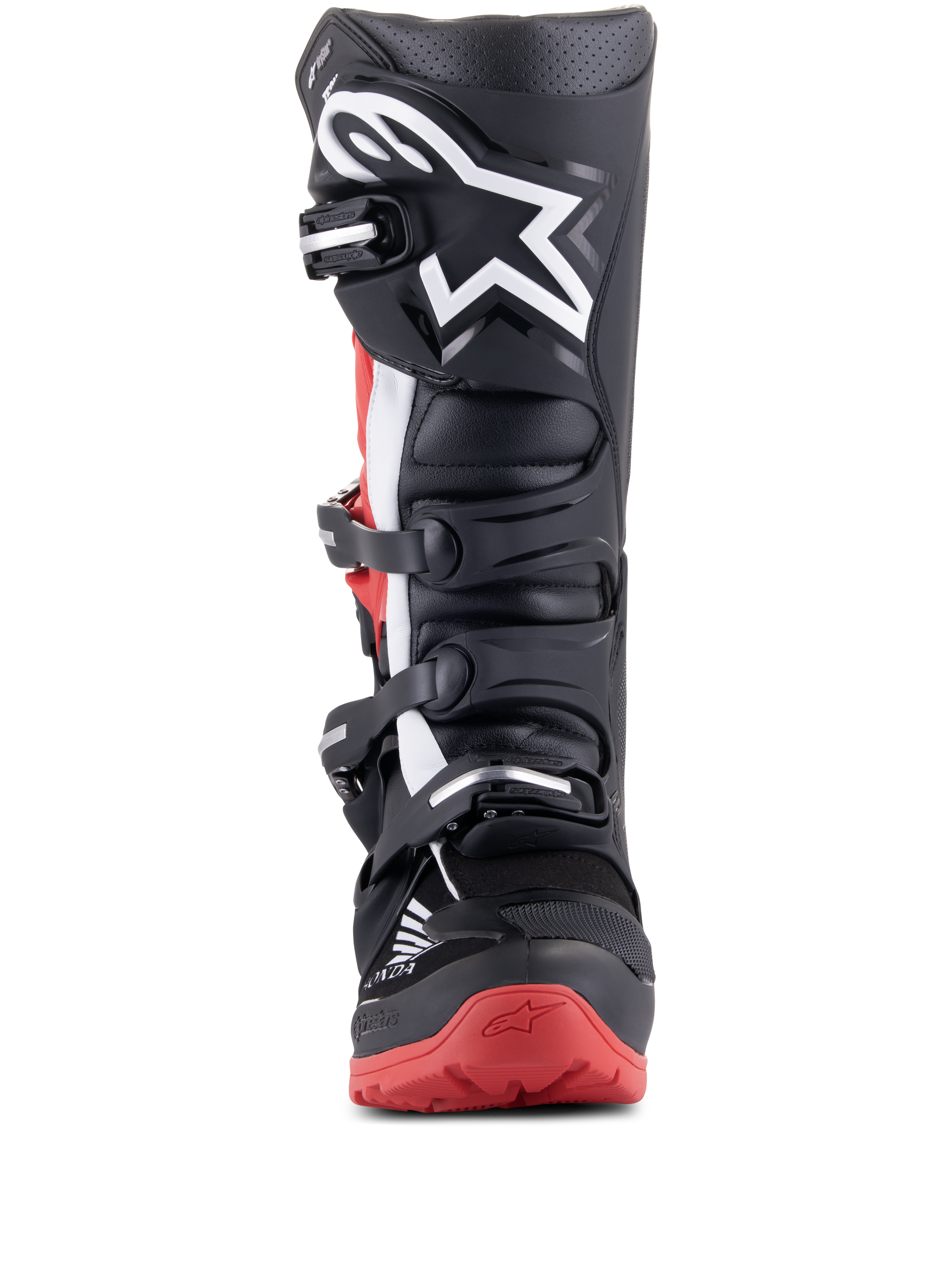 Alpinestars Honda Tech 7 Enduro Drystar-stövlar, svarta och klarröda, sedda framifrån, visar stängningssystemet med flera spännen, stor vit stjärnlogotyp på smalbenet och röd sula med Honda-logotyp, vattentäta off-road motorcykelstövlar