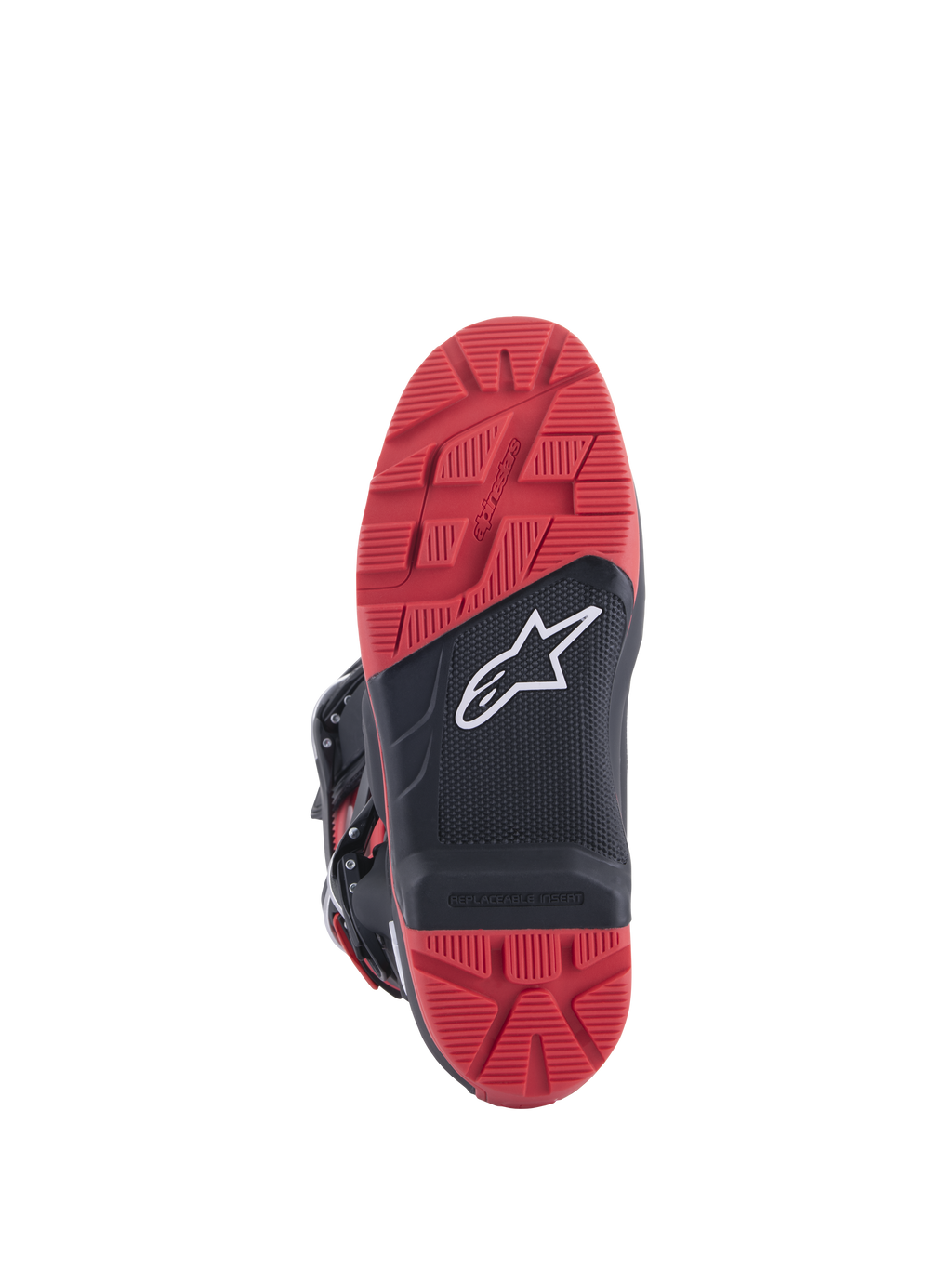Honda Tech 7 Enduro Drystar®-stövlar, svarta och klarröda, vy av sulan som visar ett greppvänligt mönster med utbytbar insats, gummikonstruktion med dubbel densitet och vit Alpinestars-logotyp på en svart texturerad panel.