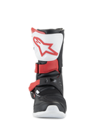 Alpinestars Kids Tech 3S-stövlar, motocross-stövlar, vit, svart och klarröd, vy framifrån som visar vit skenbensplatta med röd logotyp, svart chassi med röda spännen, skyddande offroad-stövlar för unga förare
