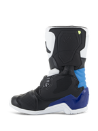 Alpinestars Kids Tech 3S Boots, Motocross Boots, White Black Enamel Blue, side profile featuring black and white panels with vibrant blue heel and ankle accents, white sole, and structured protective shell for off-road racing