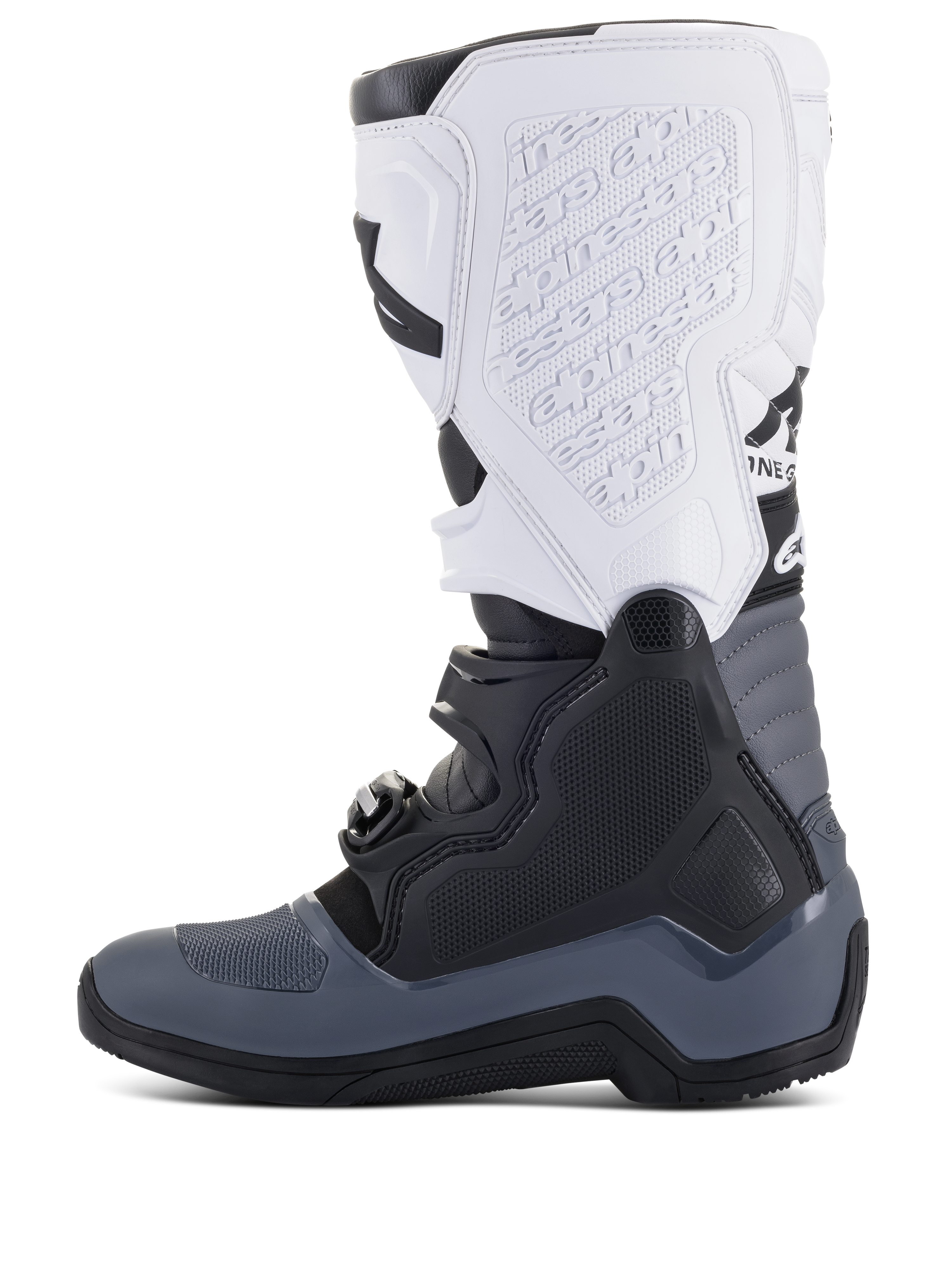 Alpinestars Tech 5-stövlar, motocross-stövlar, svarta, mörkgrå och vita, sidoprofilvy med flera spännen, präglad logotyp på det vita smalbensskyddet, hållbar konstruktion för offroad-prestanda