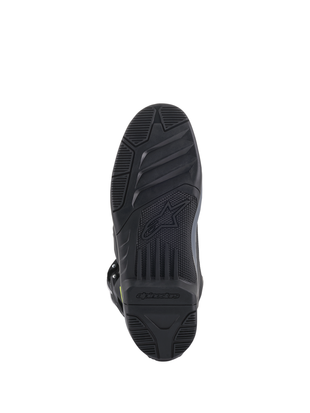 Alpinestars Tech 5-stövlar, vy av sulan, svart, detaljerat mönstrat slitbanemönster för grepp i terräng, med präglad Alpinestars-logotyp och stjärnsymbol, hållbar konstruktion för motocross