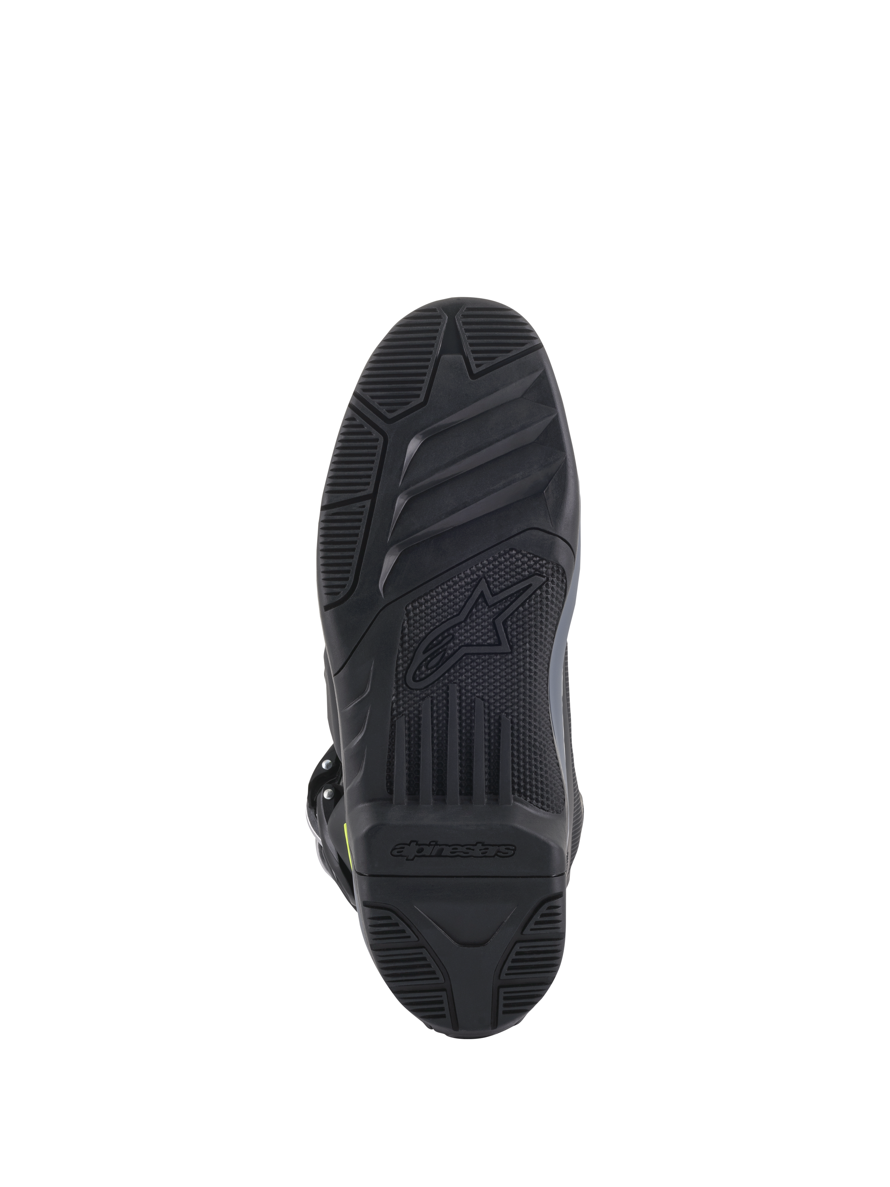 Alpinestars Tech 5-stövlar, vy av sulan, svart, detaljerat mönstrat slitbanemönster för grepp i terräng, med präglad Alpinestars-logotyp och stjärnsymbol, hållbar konstruktion för motocross
