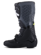 Alpinestars Tech 5 stövlar, motocross-stövlar, svarta och Cool Gray med Yellow Fluo-detaljer, sidoprofil som visar hög multipanelkonstruktion, spännsystem och texturerad skenbensplatta med präglad logotyp, terrängskor för racing