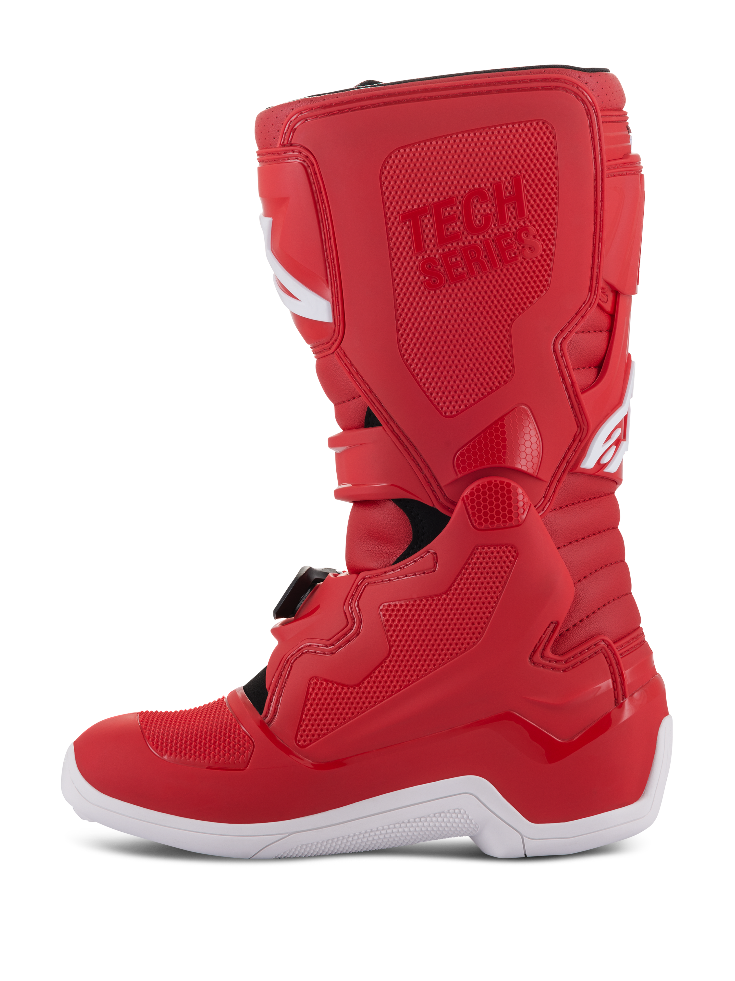 Alpinestars Youth Tech 7S-stövlar, motocross-stövlar för ungdomar, röda med vit sula, TPU-förstärkta paneler, flera spännen och 'TECH SERIES'-logotyp, designade för juniorförare inom terrängkörning