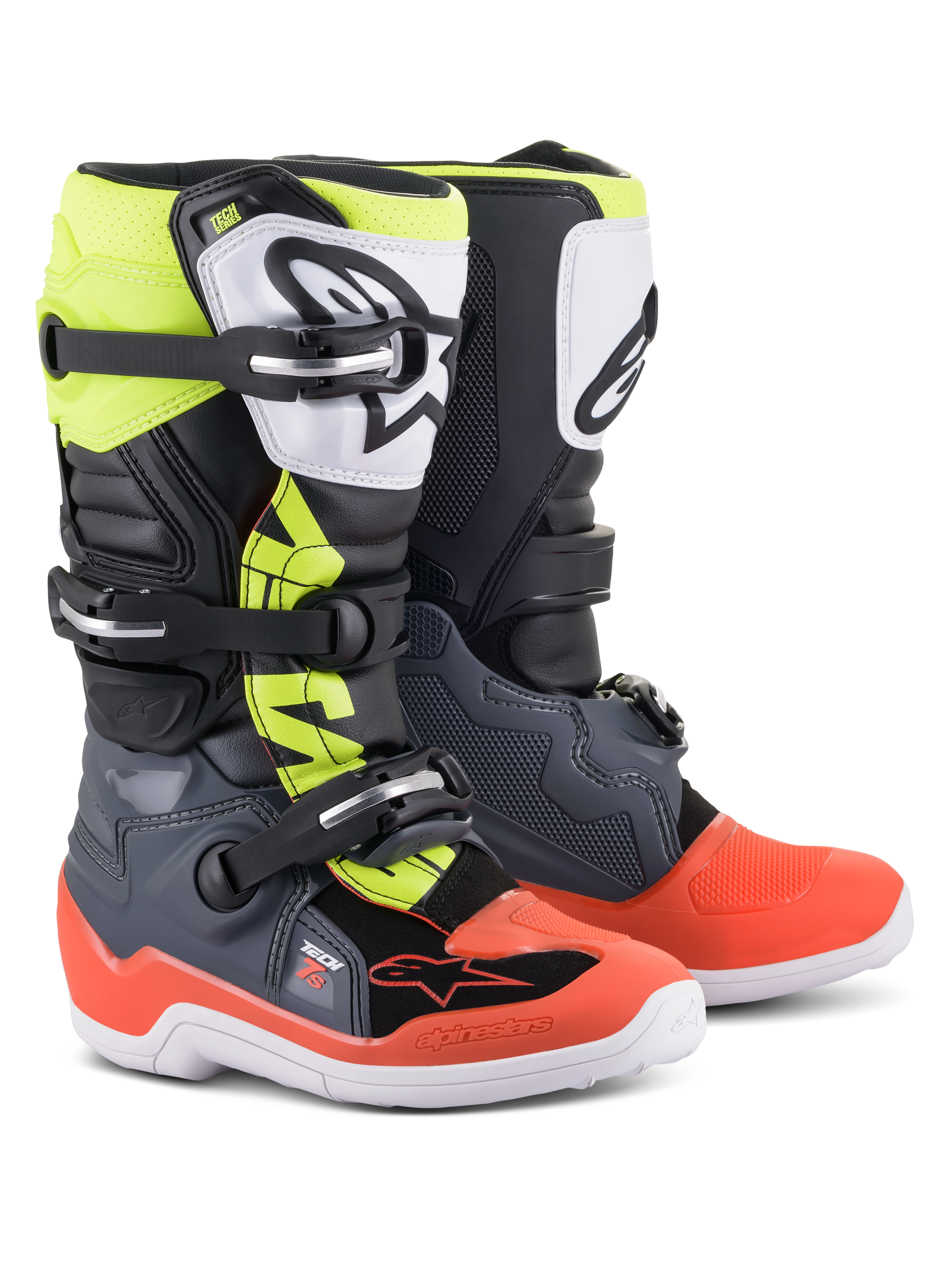 Alpinestars Youth Tech 7S-stövlar, motocrossstövlar, mörkgrå med röda och fluoriserande gula detaljer, vit TPU-skenbensplatta med svart logotyp, stängningssystem med tre spännen och hållbar vit sula, utvecklad för juniorförare för terrängkörning