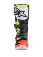 Alpinestars Youth Tech 7S stövlar, motocross-stövlar, mörkgrå, fluorescerande röd och gul med vita detaljer, framifrån med en vit TPU-skenbensplatta med svart logotyp, spännsystem med tre spännen och hållbar syntetisk konstruktion för unga terrängkörare