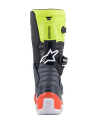 Alpinestars Youth Tech 7S-stövlar, motocross-stövlar för ungdomar, mörkgrå, fluorescerande röd och fluorescerande gul, vy bakifrån som visar dragspelsformade flexzoner, rött hälskydd och vit Alpinestars-logotyp