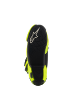 Alpinestars Supertech R Boots, Motorcycle Racing Boots, Yellow Fluo Black, bottom view showing black textured sole with white Alpinestars logo and bright yellow side panels