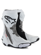 Alpinestars Supertech R Vented Boots, Racing Motorcycle Boots, White Mid Gray and Black, featuring perforated microfiber construction for airflow, TPU shin plate with Alpinestars logo, and replaceable sliders, professional track-ready design