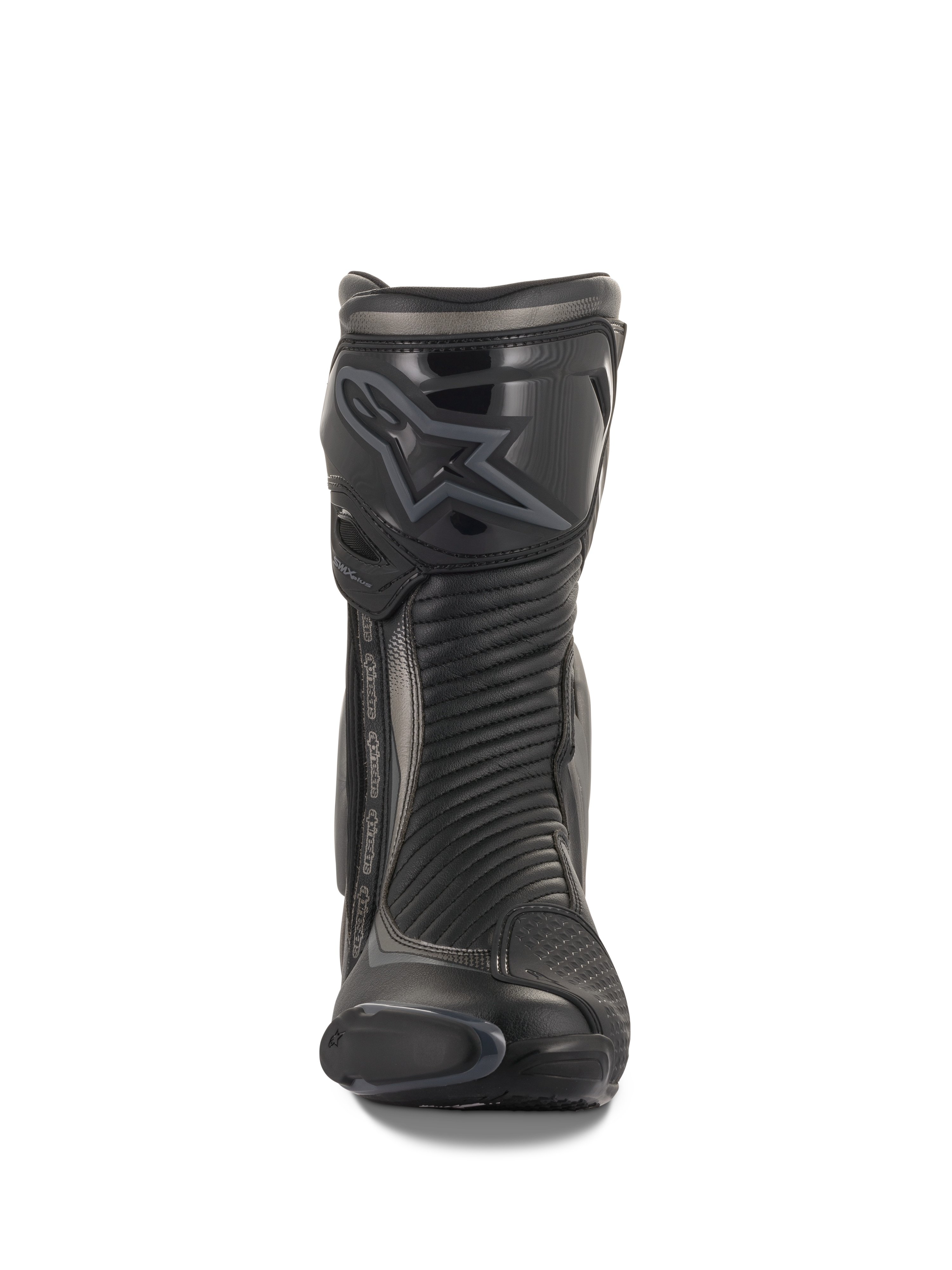 Alpinestars SMX Plus V2 Boots, Racing and Sport Motorcycle Boots, Black and Dark Gray, front view featuring a contoured TPU shin protector with Alpinestars logo, accordion flex panels for movement, and a sleek aerodynamic profile for performance riding.