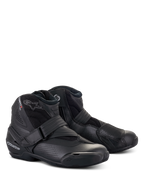 Alpinestars SMX-1 R V2 Vented Boots, low-cut motorcycle riding shoes, all-black design, featuring perforated microfiber upper, TPU heel counter and shift pad, with a secure strap and side zipper closure, three-quarter front view