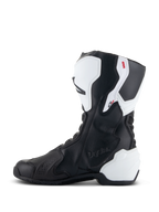 Alpinestars Stella SMX-6 V3 Drystar® Boots, Women's Performance Riding Boots, White and Black, medial side view featuring embossed Drystar branding, white TPU shin and heel protection, and sleek black microfiber upper for track and street performance.