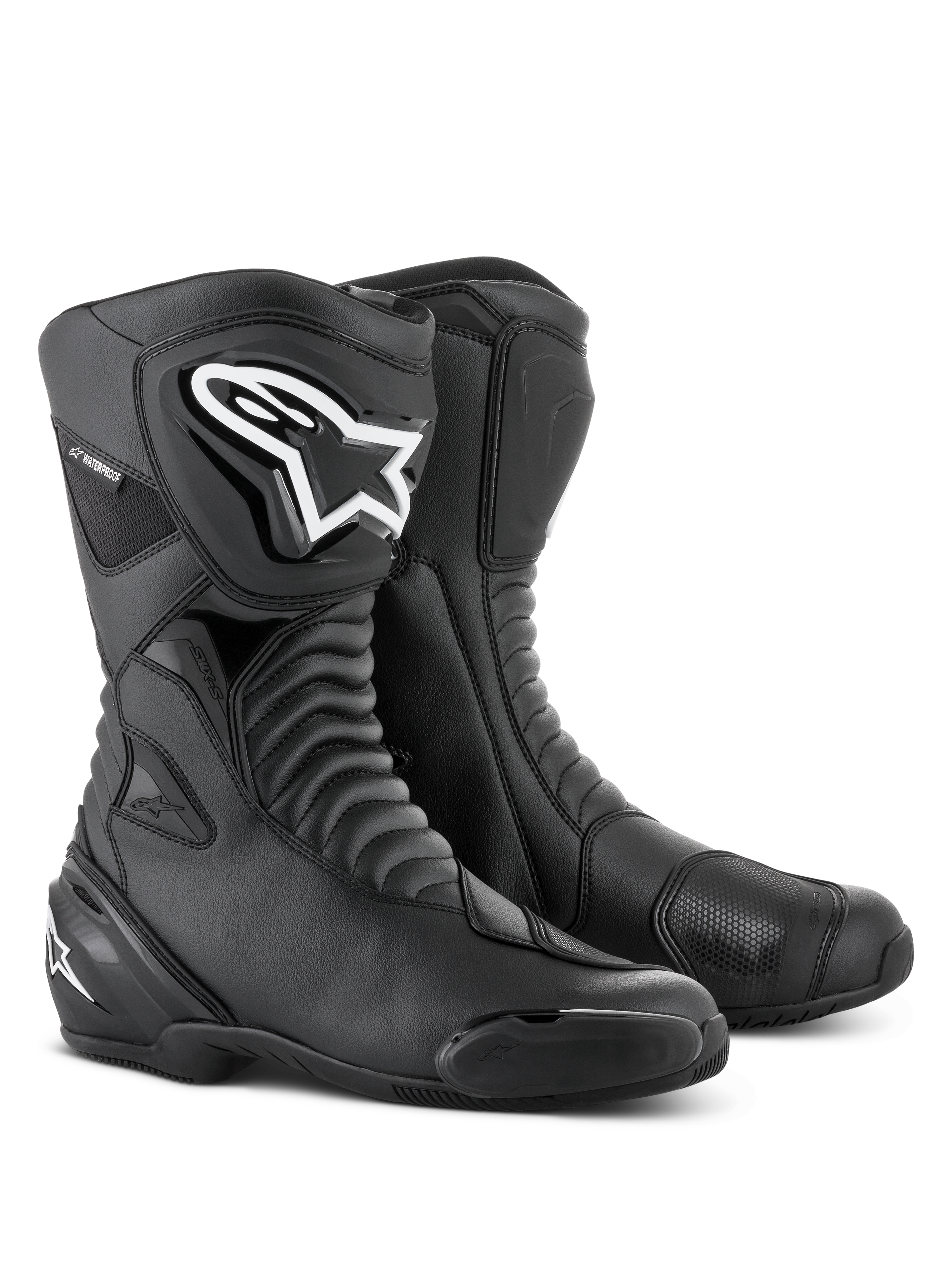 Alpinestars SMX S Waterproof Boots in Black Black, tall motorcycle boots featuring accordion flex zones, a prominent white Alpinestars logo on the TPU shin protector, reinforced shift pads, and replaceable toe sliders, designed for sport-touring and all-weather road riding.