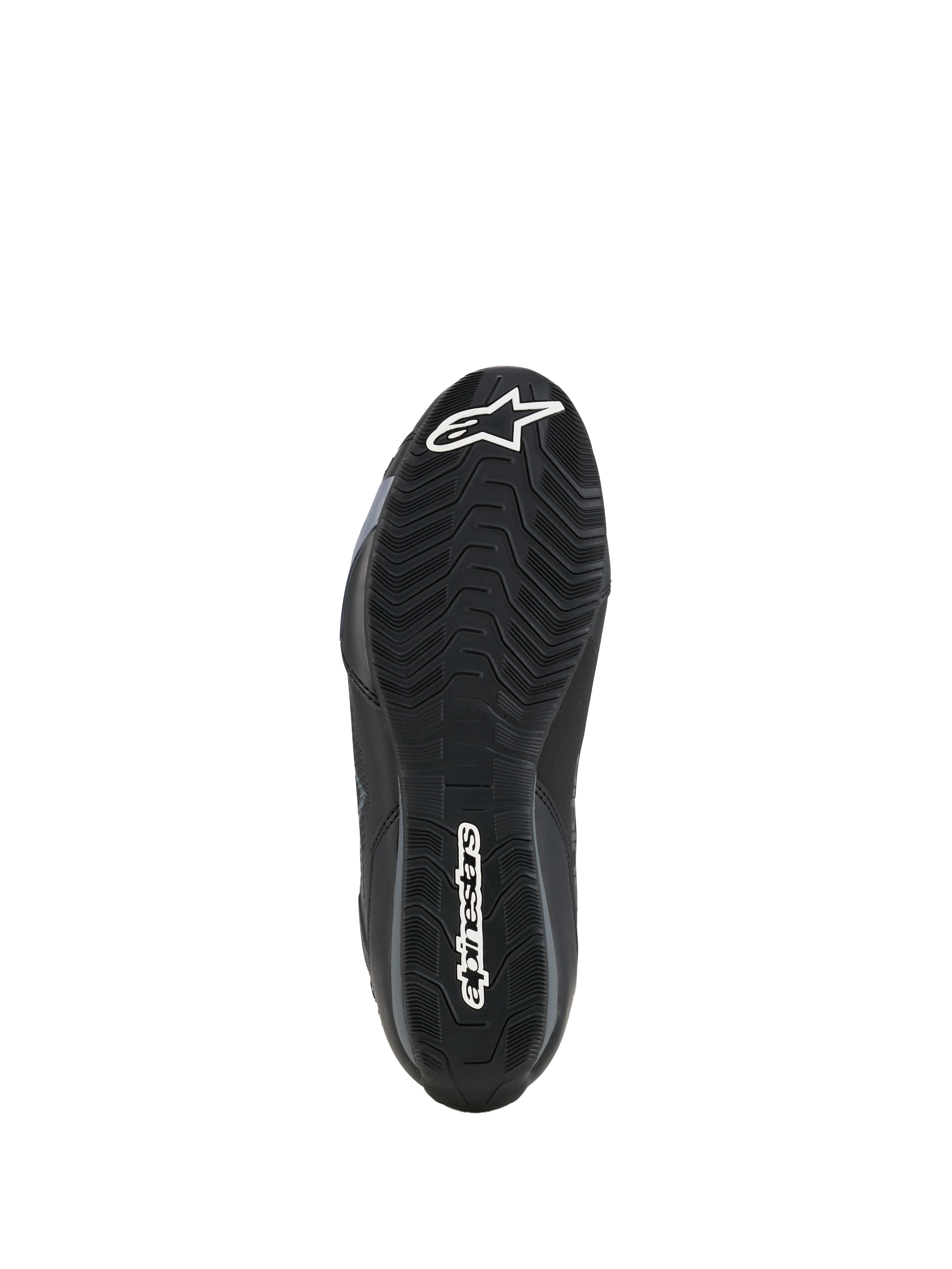 Alpinestars Celer skor, vy av sulans undersida, svart oljebeständig gummiblandning med texturerat vågigt greppmönster, vit Alpinestars-logotyp på tå och häl, utformad för grepp på motorcykelns fotpinnar