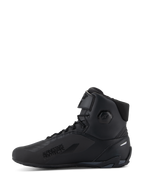 Alpinestars Faster-4 Shoes, Motorcycle Riding Shoes, Black, side profile view, high-top design with lace closure and adjustable top strap, 'Alpinestars Protects' text on lateral side, sleek microfiber upper with integrated protection zones