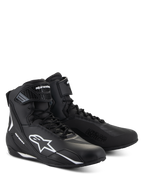 Alpinestars Faster-4 Shoes, black motorcycle riding shoes with white accents, mid-cut design featuring white Astars logo, 'Alpinestars Protects' text on the toe, and a combination lace and hook-and-loop closure.