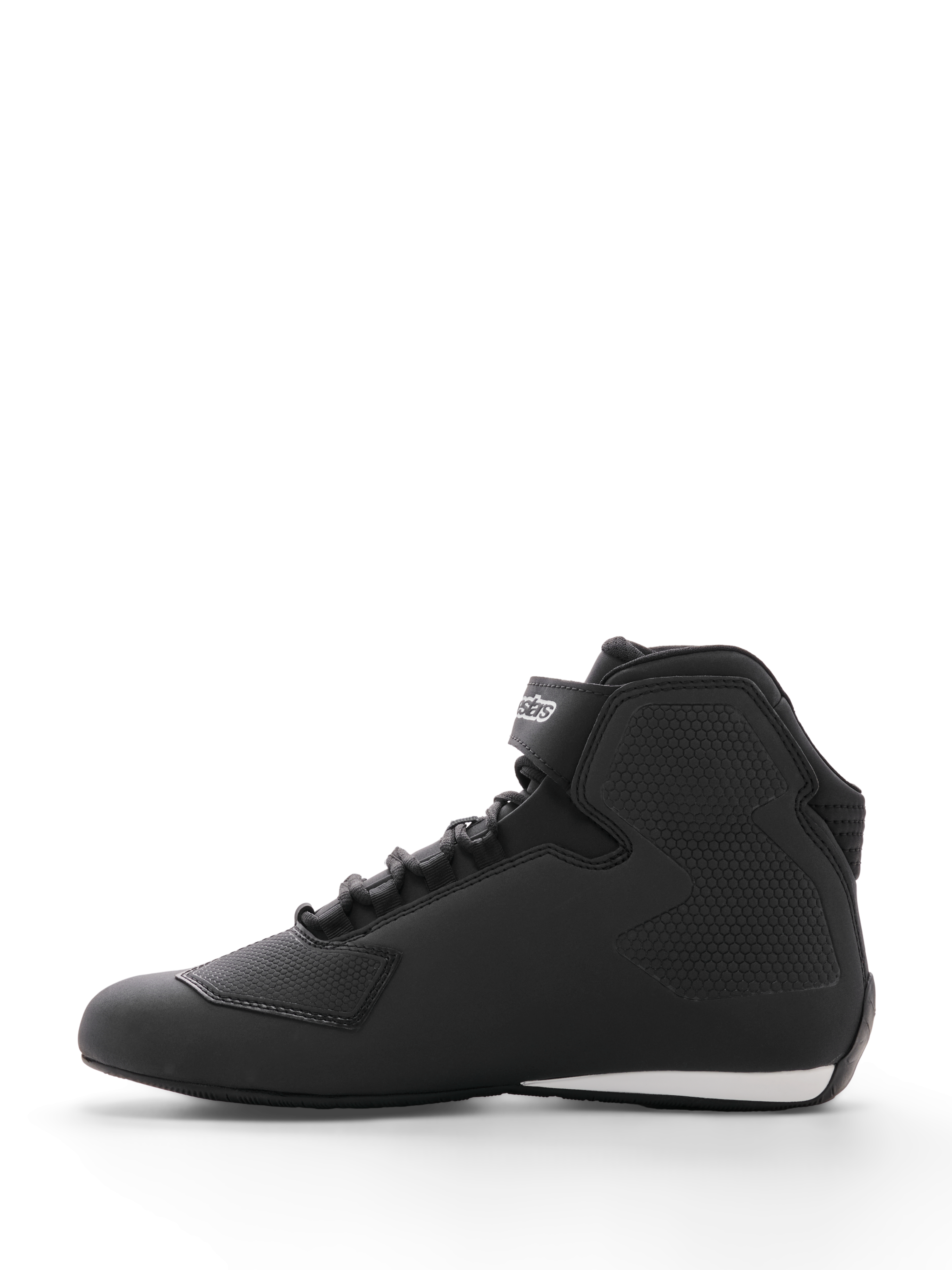 Alpinestars Sektor Shoe, Motorcycle Riding Shoe, Black, side profile view, featuring a sleek microfiber upper with honeycomb textured ankle panels, speed lacing system, ankle strap with logo, and a white accent on the heel, designed for road and sport riding