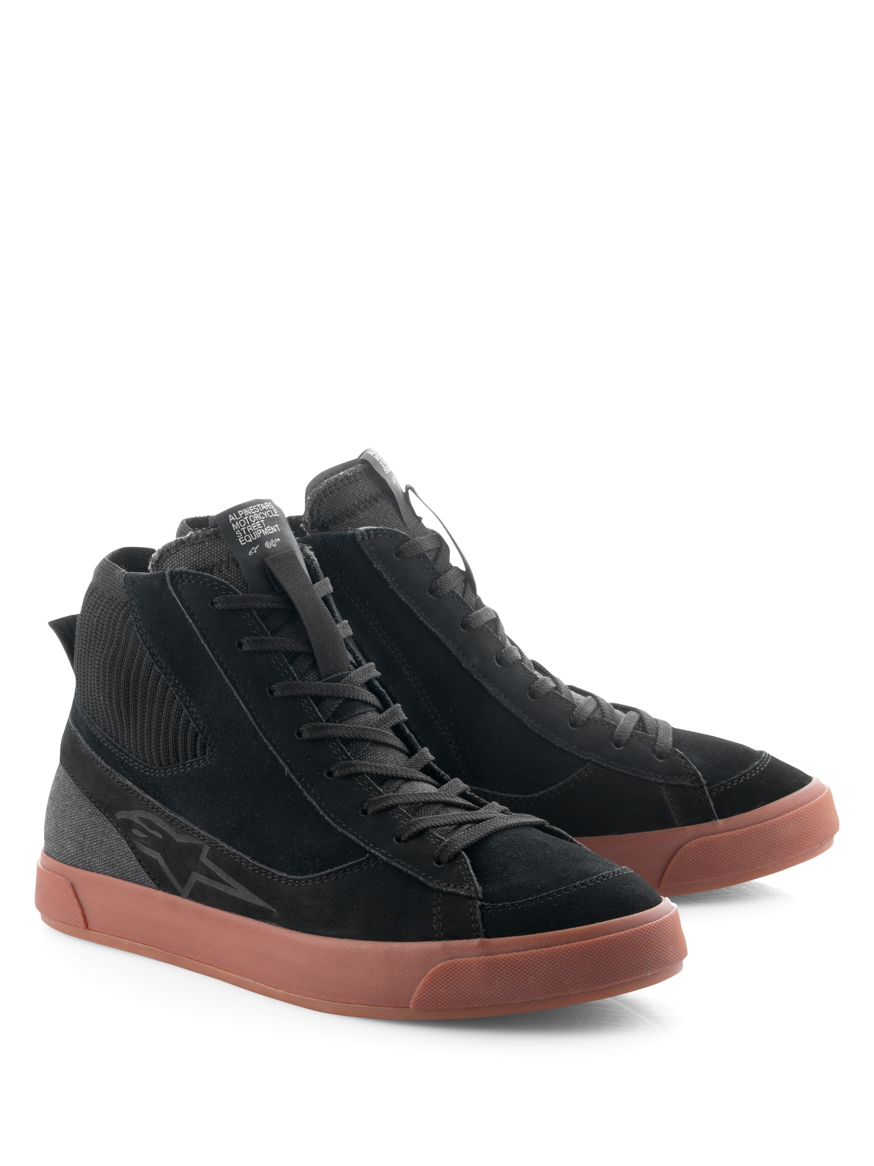 Alpinestars Stated Shoes, urbana mc-skor, svarta med brun gummisula, high-top-siluett med ovandel i svart mocka och canvas, retro skatestilsinspirerad design för gatu- och vägbruk