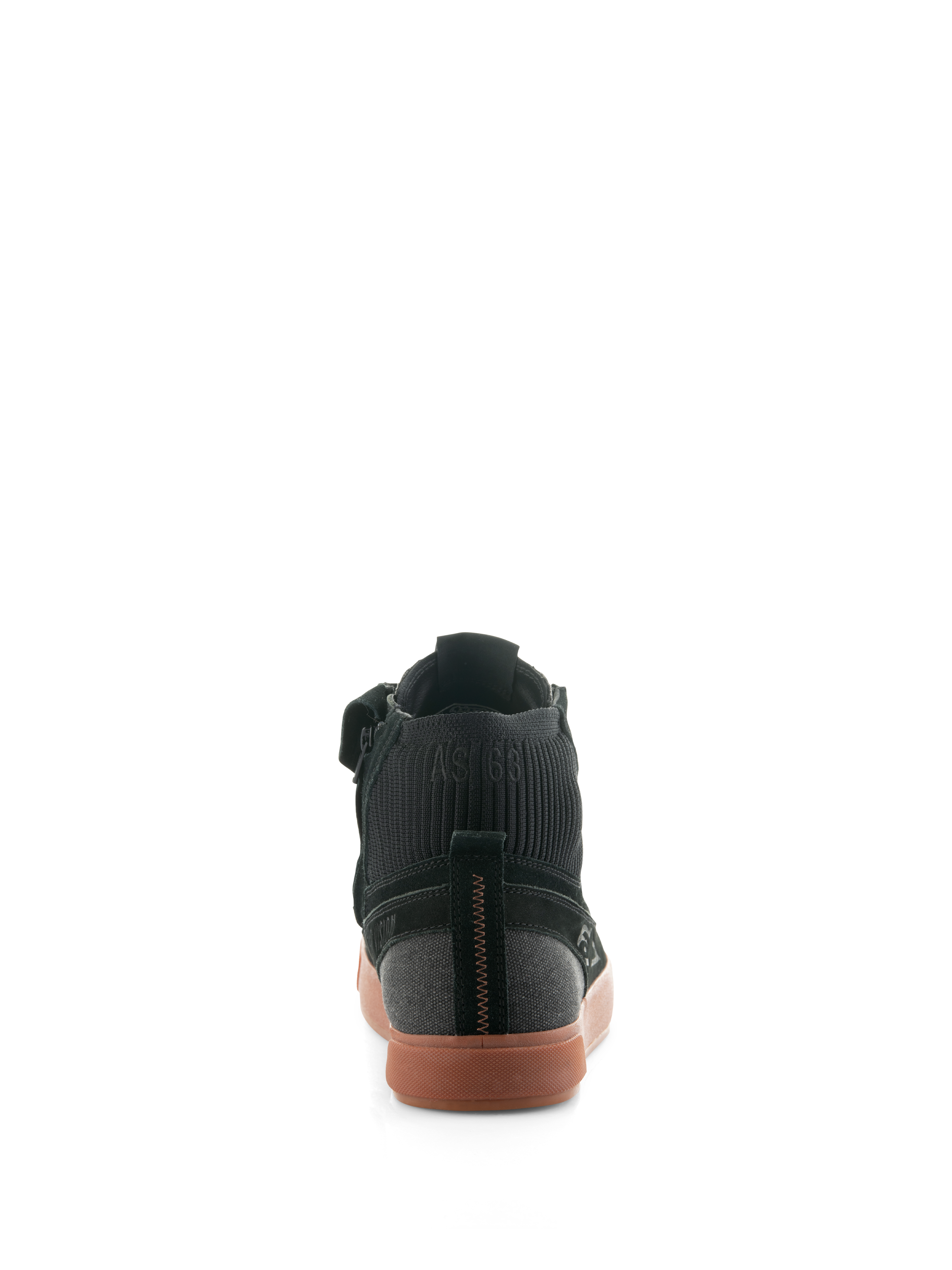 Alpinestars Stated Shoes, urbana motorskor i Black Gum, vy bakifrån som visar den vulkaniserade gummisulan, ovandel i svart mocka och canvas samt ribbstickad vristkrage