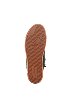 Alpinestars Stated-skor, Black Gum, undersida av den vulkaniserade gummisulan med fiskbensmönster, Alpinestars-logotyp och TPF-märkning (Transversal Protection Frame), urbana motorcykelskor
