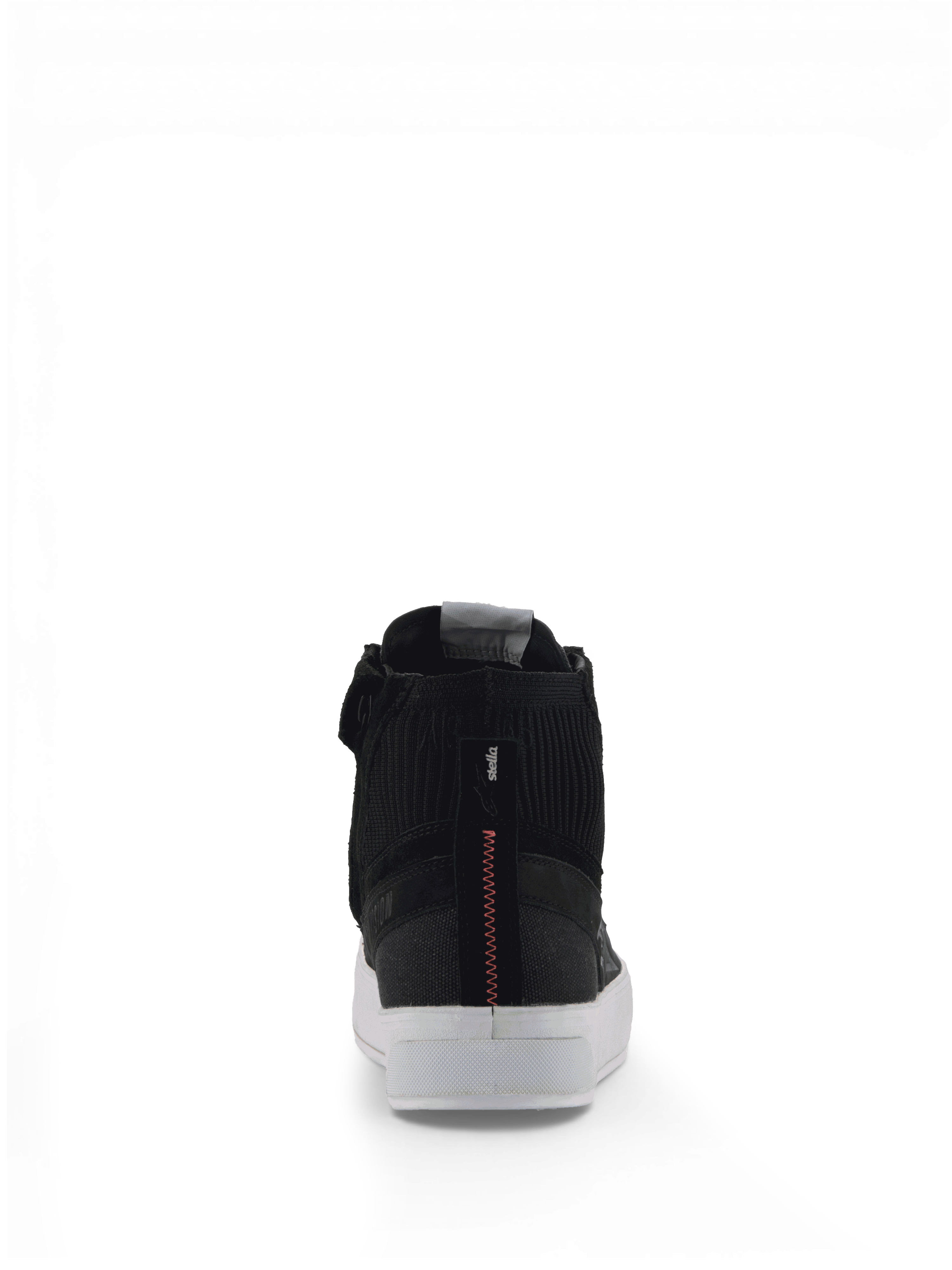 Alpinestars Stella Stated Podium skor, urbana motorcykelsneakers för dam, svarta och vita med röd sicksacksöm på hälen, vit vulkaniserad sula.