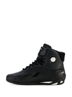 Alpinestars Stella Faster-4 Drystar®-skor för dam, svarta och silvriga, sidovy i profil, vattentäta motorcykelskor med ovandel i mikrofiber, snörning och kardborreband, med Drystar-logotyp och silvrig ankellogotyp.