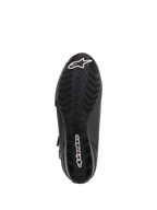 Alpinestars Faster-3 Drystar® mc-skor, vy av sulan, svart gummi med vågformat mönstrat grepp, vit Alpinestars-stjärnlogotyp på tån och ordmärke på hälen, tekniska motorcykelskor
