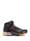 Alpinestars CR-X Drystar® ridingskor, urbana motorcykelskor, svarta, grå och orange med ljusbrun mellansula, hög design med kardborreband vid ankeln, klarorange logotyp och robust sula med orangea detaljer