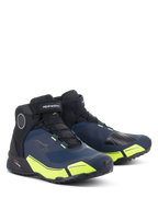 Alpinestars CR-X Drystar® motorcykelskor, svarta, mörkblå och neongula, vattentäta mc-skor med en löparskosilhuett, mid-cut-design med atletisk stil och lysande fluorescerande gula detaljer.