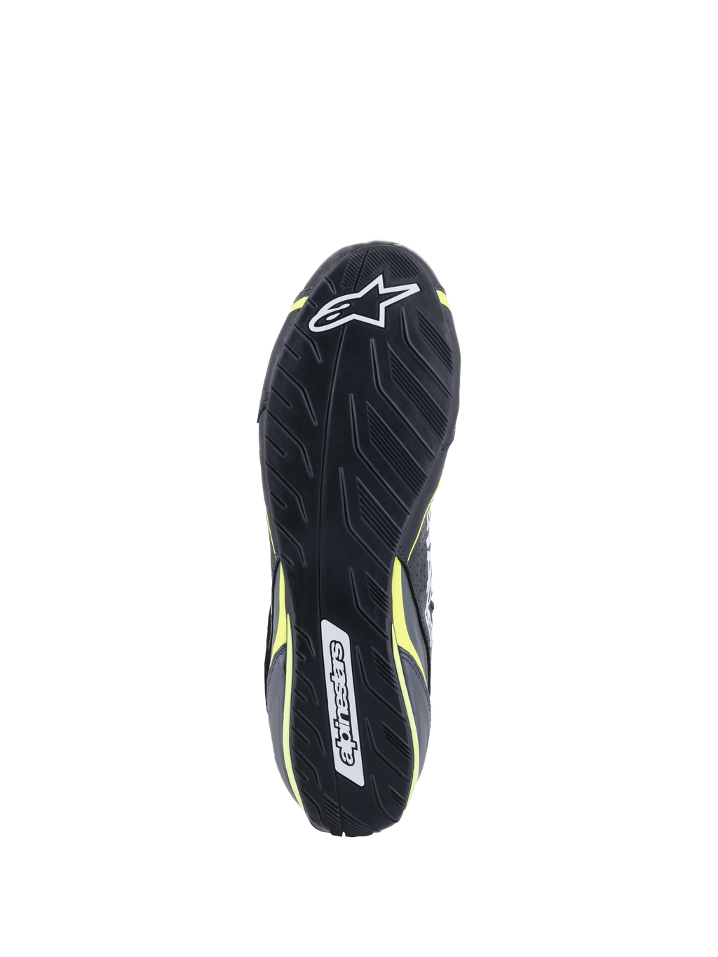 Alpinestars Tech-1 T V3 Shoes FIA, Outsole view, Black with Yellow Fluo accents, asymmetric tire-tread inspired rubber sole, featuring Alpinestars logos and textured pattern for pedal sensitivity and grip.