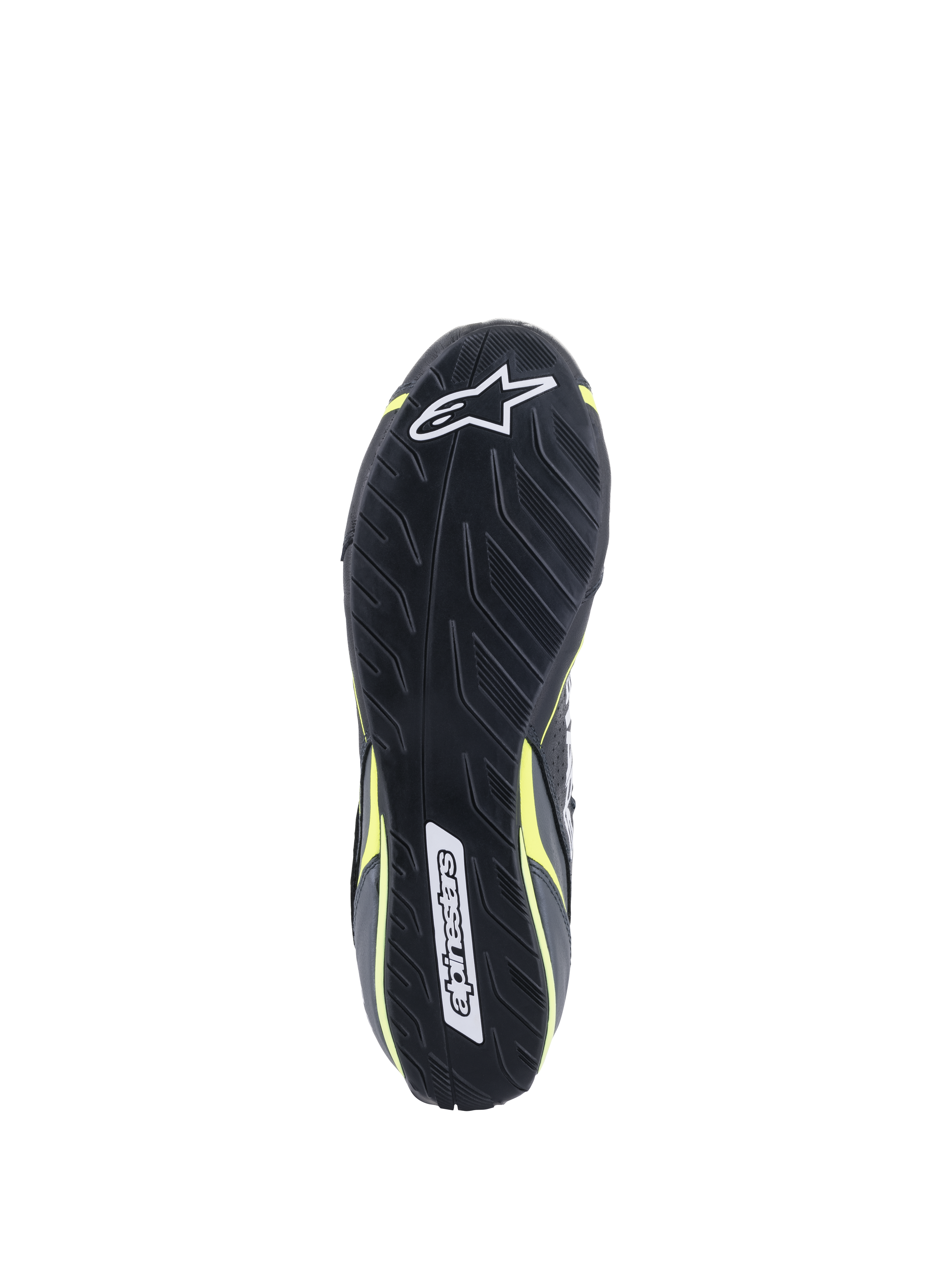 Alpinestars Tech-1 T V3 Shoes FIA, Outsole view, Black with Yellow Fluo accents, asymmetric tire-tread inspired rubber sole, featuring Alpinestars logos and textured pattern for pedal sensitivity and grip.