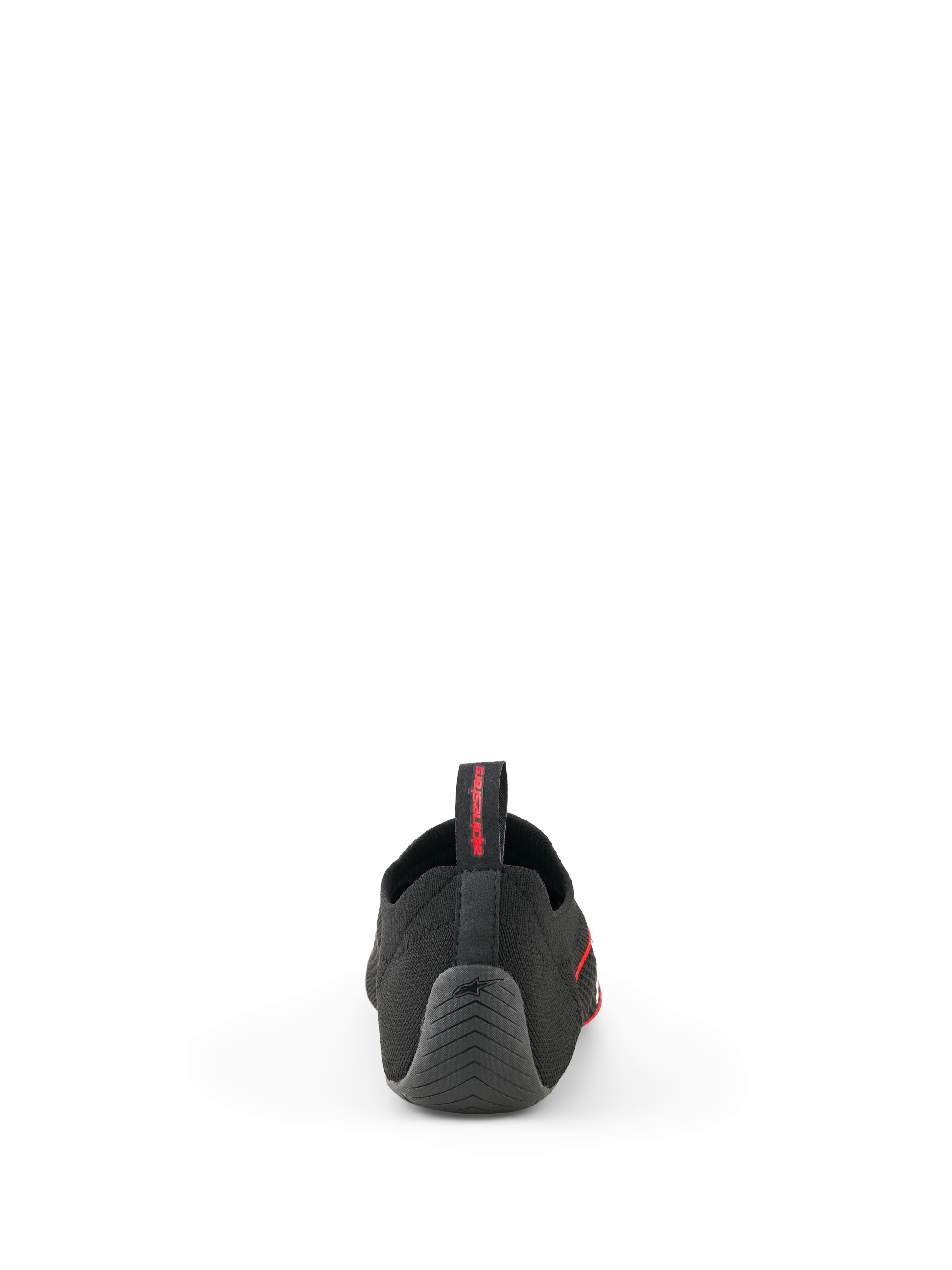 Alpinestars Tech Gaming Shoes, svarta, vy bakifrån som visar den sömlösa stickade ovandelen, texturerad gummiklack med stjärnlogotyp och bakre dragflik med röd logotyp, SIM-racing-skor