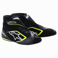 Alpinestars SP+ Shoes, Auto Racing Shoes, Black and Yellow Fluo, high-top design with white star logo and neon yellow accents, leather and suede construction, thin F1-inspired rubber soles, sporty motorsport aesthetic