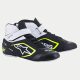 Alpinestars Tech-1 K V2 Shoes, Karting Footwear, Black White and Yellow Fluo, mid-top racing shoes featuring perforated microfiber, dual closure system with white velcro strap and laces, bold Alpinestars branding on the side.