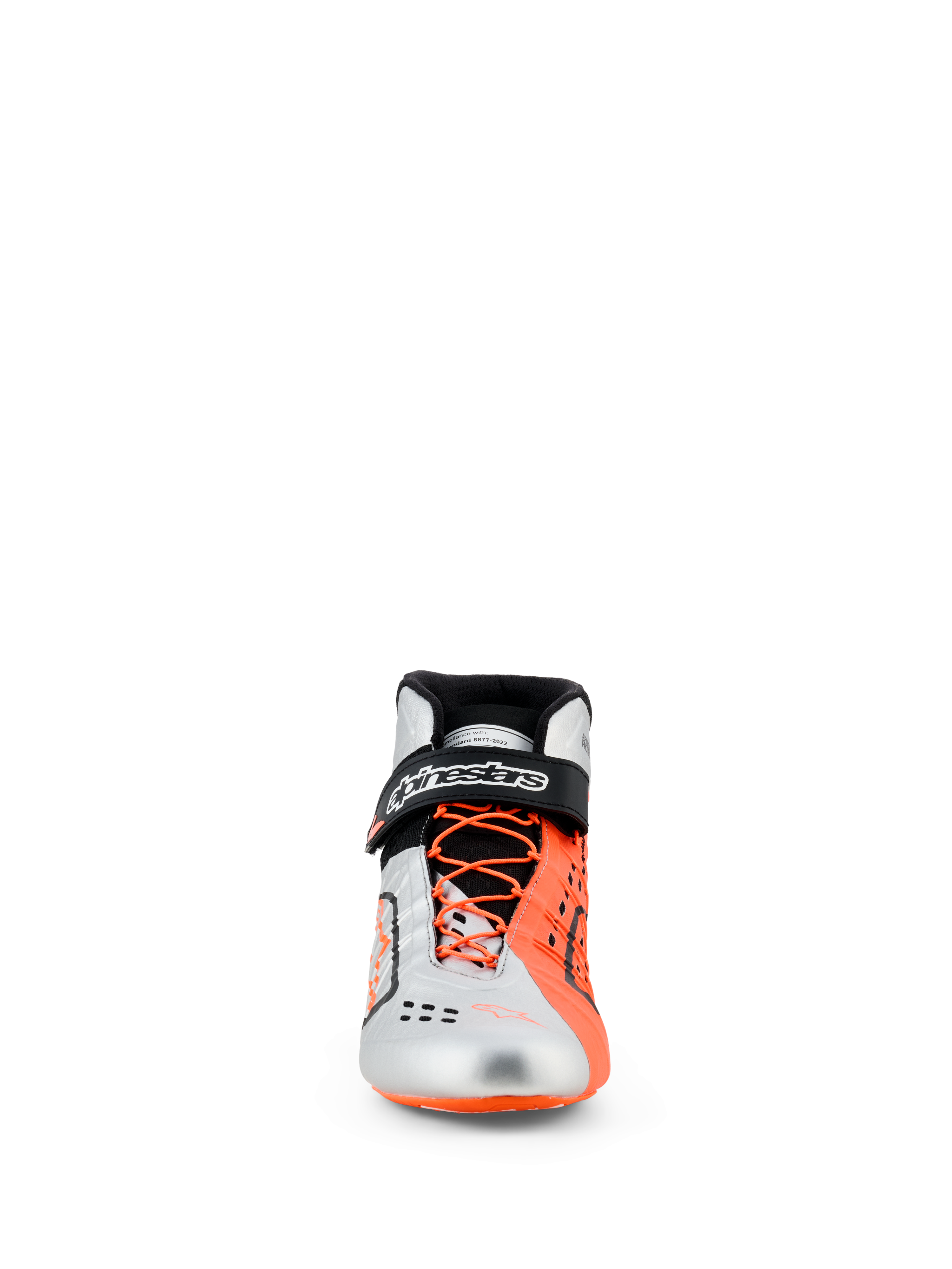 Alpinestars Tech-1 KX V3-skor, kartingskor, svart, silver och orange fluo, vy framifrån, ovandel i silver och fluorescerande orange, asymmetrisk orange snörning, svart vristrem med vit logotyp, eleganta FIA-certifierade racingskor