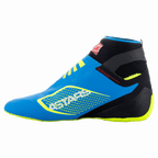 Alpinestars Tech-1 KZ V2-skor, kartingskor, Enamel Blue med svarta och Yellow Fluo-detaljer, profilvy från sidan med sömlös stickad ovandel och tunn yttersula i gummi hämtad från Formel 1, framträdande ASTARS-logotyp på sidan.