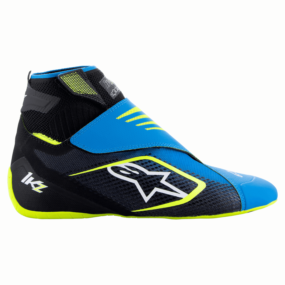 Alpinestars Tech-1 KZ V2-skor, kartingskor, svart, emaljblå och gul fluo, profilvy som visar den stickade ovandelen, dubbel remstängning och framträdande vit Alpinestars-logotyp, designade för pedalkänsla inom motorsport.