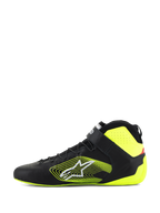 Alpinestars Tech-1 Z V3-skor FIA, racingskor för bilsport, svart och neongul, sidoprofil, ovandel i premiumläder med snabbsnörning och ankelrem, framträdande gul grafisk logotyp på sidan, fluorescerande gula detaljer på häl och krage