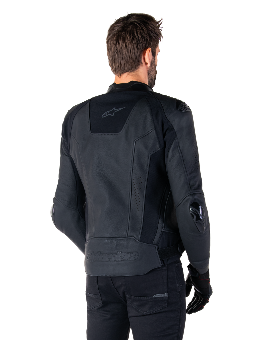 Alpinestars Missile V3 Läderjacka, svart, sedd bakifrån på modell, förstklassig racingjacka i läder, med präglad Alpinestars-logotyp på nedre ryggen och TPU-armbågsskydd.