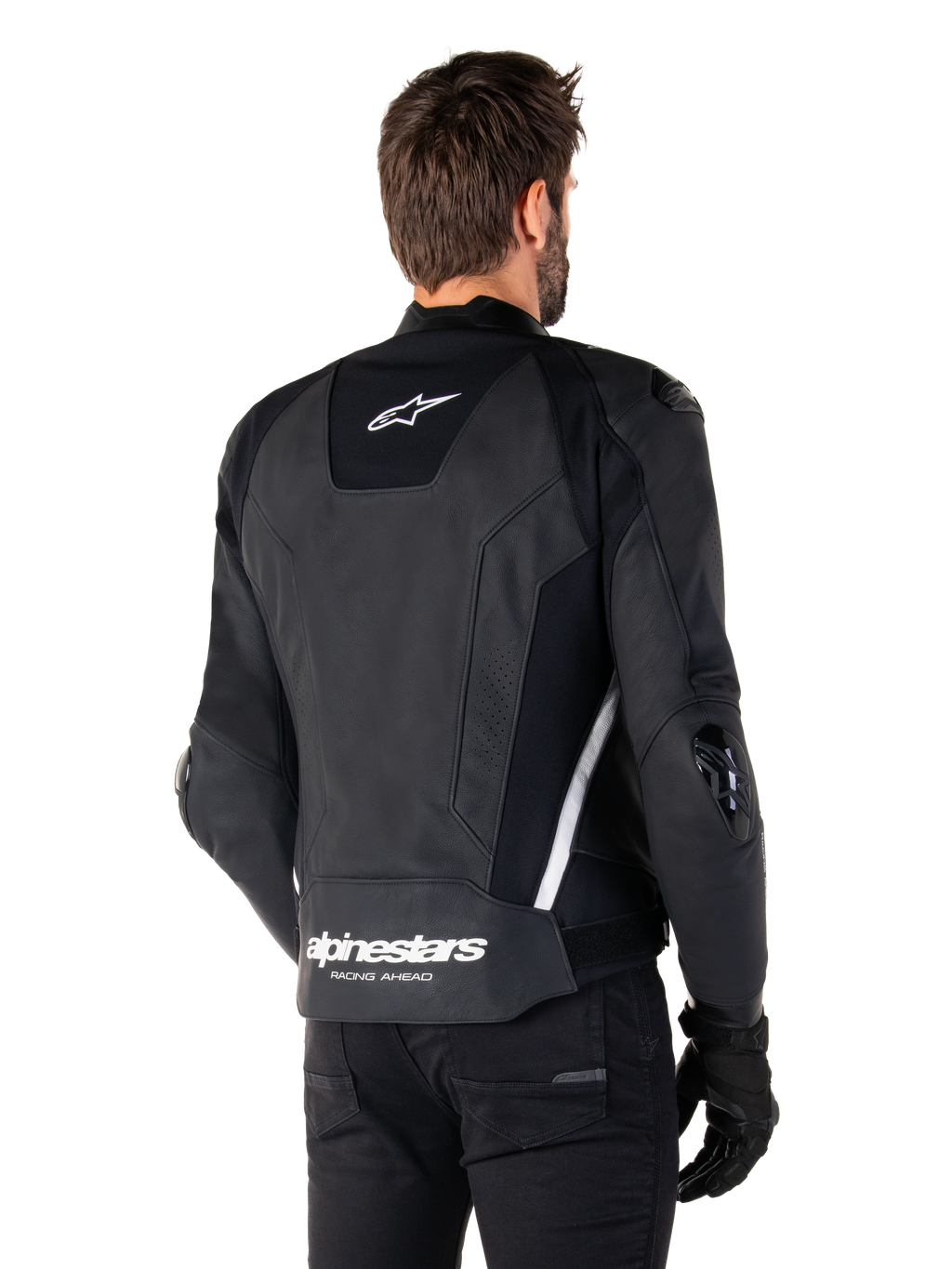 Alpinestars Missile V3 skinnjacka, baksida, svart och vit, med Alpinestars stjärnlogotyp på övre ryggen och ordmärke på nedre ryggen, skyddande sliders på armbågar och axlar, förstklassig racingutrustning i läder.