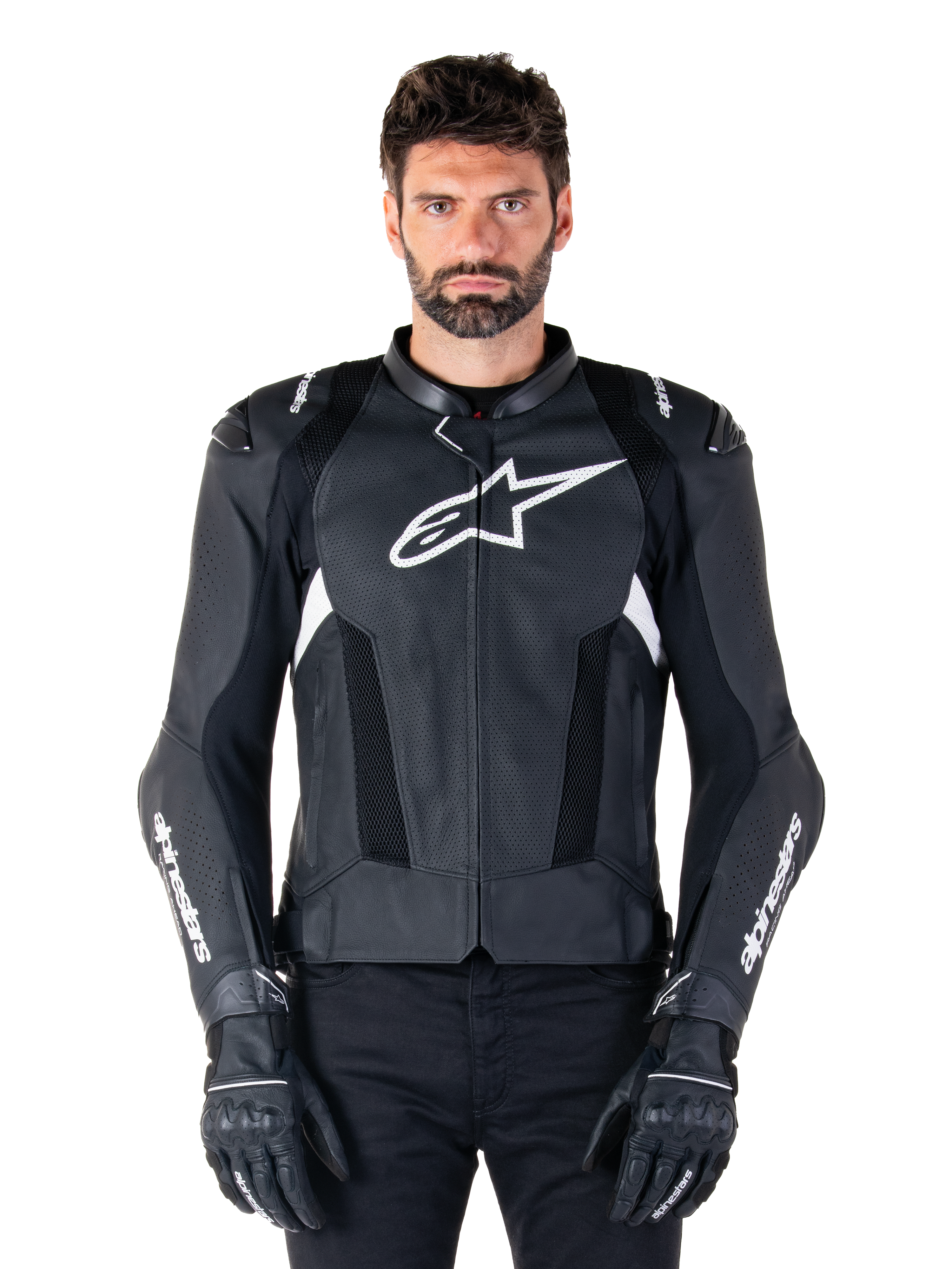 Alpinestars Missile V3 Airflow läderjacka, svart och vit, motorcykelracerjacka med perforerade ventilationspaneler i läder, stor vit stjärnlogotyp på bröstet, bärs med matchande handskar, sportig skyddsdesign