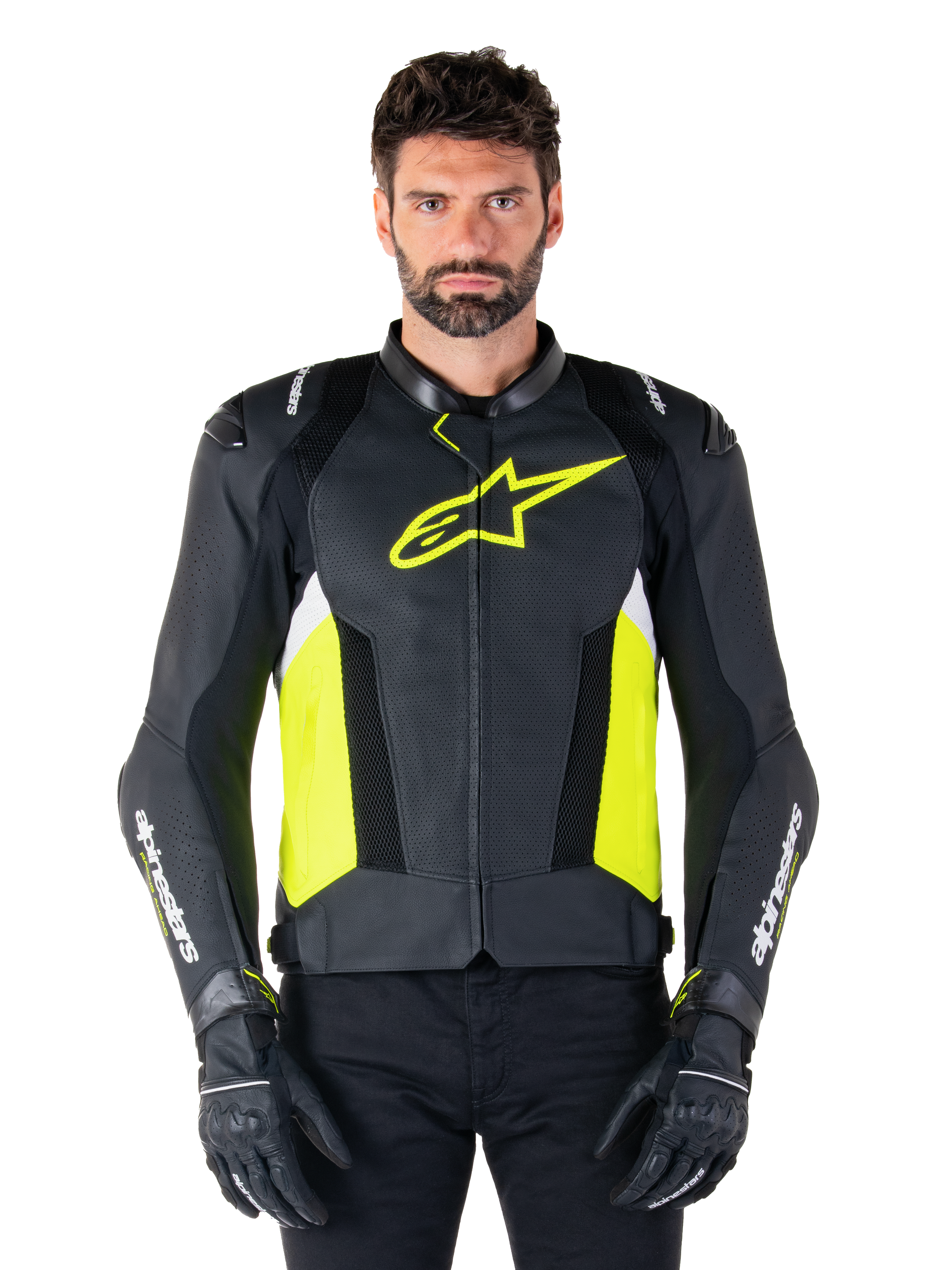 Alpinestars Missile V3 Airflow läderjacka, sportig motorcykeljacka för racing, svart, neongul och vit, bärs av en modell med svarta körhandskar, med perforerat läder på bröstet, framträdande neongul logotyp och vit text på ärmarna.