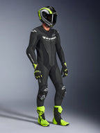 Alpinestars GP Force V2 Leather Suit, 1-Piece Motorcycle Suit, Black with white branding, worn with matching neon yellow and black helmet, gloves, and boots, high-performance racing gear for track and sport riding