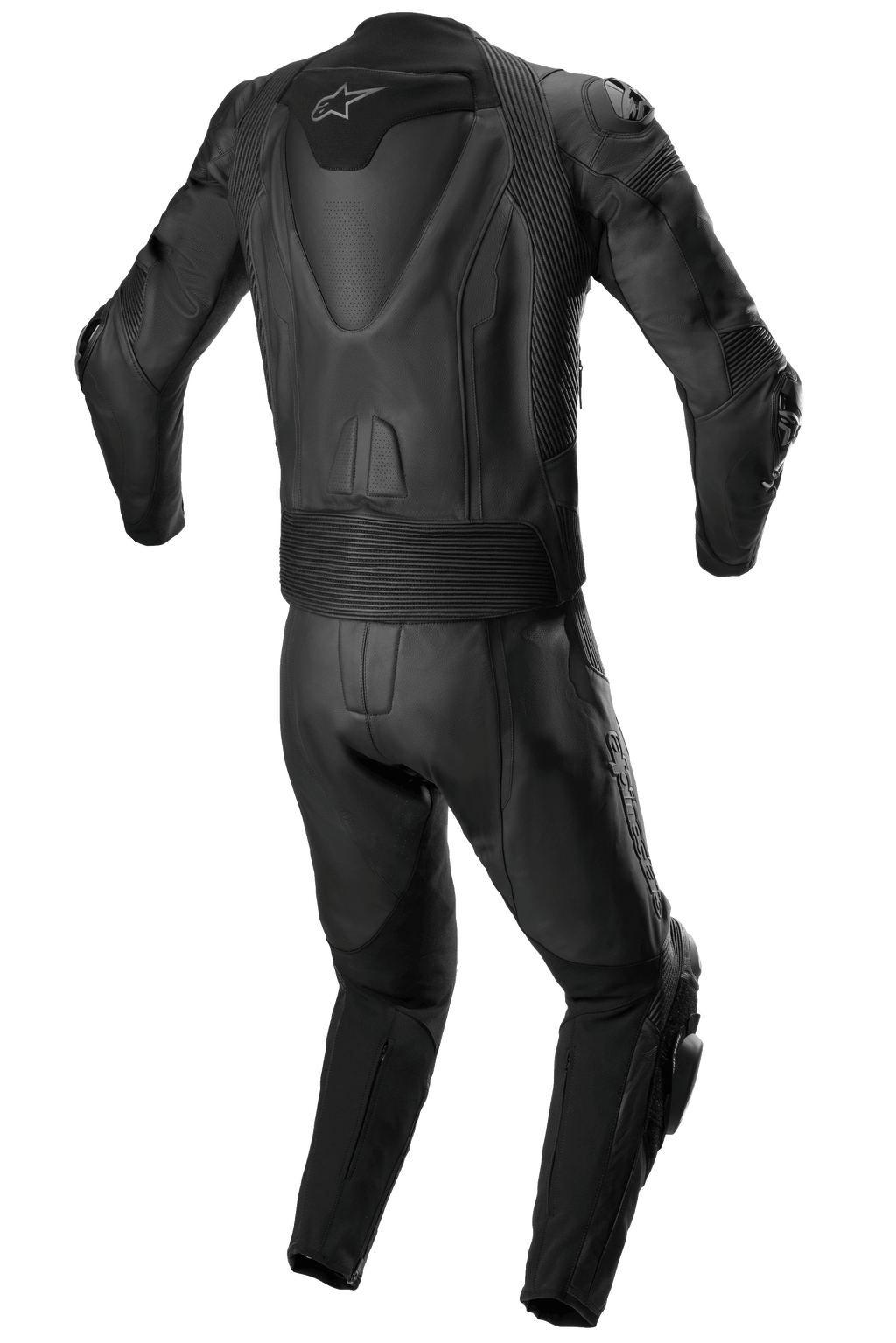 Alpinestars Missile V2 tvådelat skinnställ, racingskinnställ, helsvart, vy bakifrån som visar aerodynamisk ryggpuckel med vit stjärnlogotyp, dragspelsstretchpaneler vid midjan och axlarna, och perforerade läderdetaljer för högpresterande motorcykelkörning