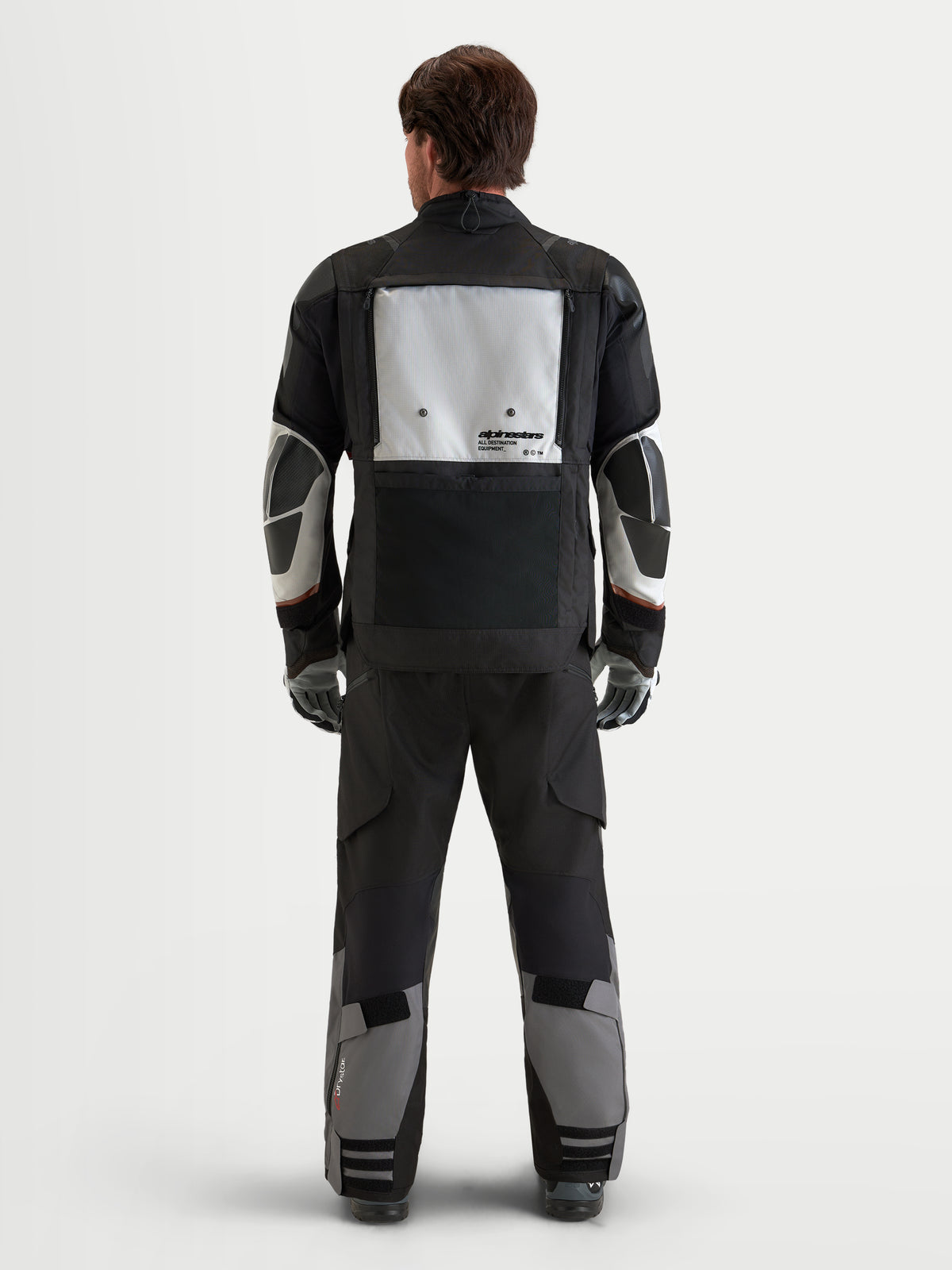 Alpinestars Harok V2 Drystar jacka, äventyrstouring MC-jacka i textil, mörkgrå och isgrå, vy bakifrån som visar modulär ventilationspanel och skyddskonstruktion