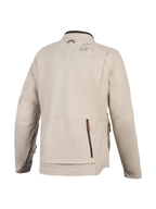 Alpinestars Borrego Drystar® jacka, motorcykeljacka, varmgrå, baksida med ett stort bakre fack med dragkedja, hållbar konstruktion i textilcanvas med Alpinestars-logotyp på axeln, äventyrsklar design