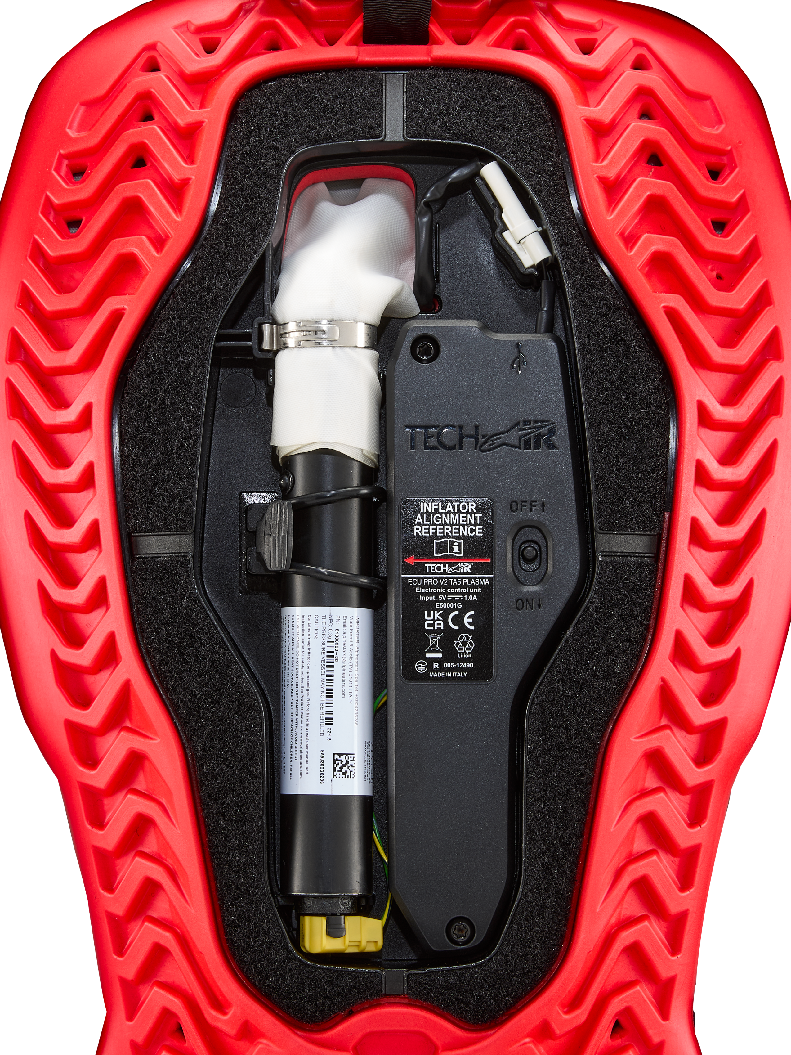 Alpinestars Tech-Air 5 Plasma reservpatron för airbag, svart ECU och vit uppblåsare i ett rött ribbat skal