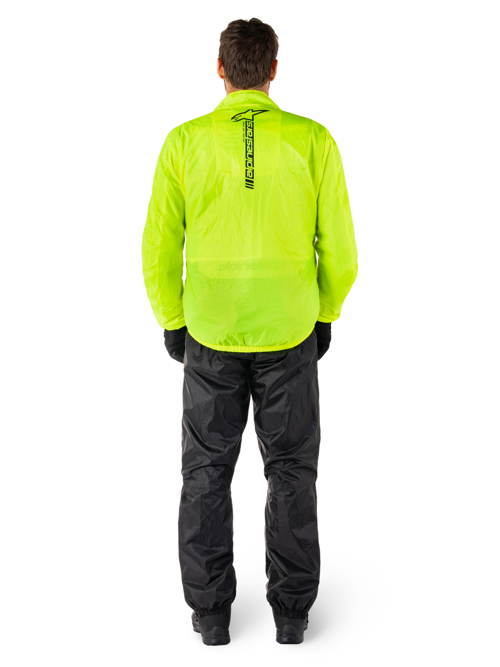 Alpinestars Hurricane Rain V2 jacka och byxor, vattentätt regnställ för motorcykel, klar fluorescerande gul jacka med vertikal svart logotyp på ryggen, svarta byxor, lätt textilmaterial designat för skydd vid körning i vått väder